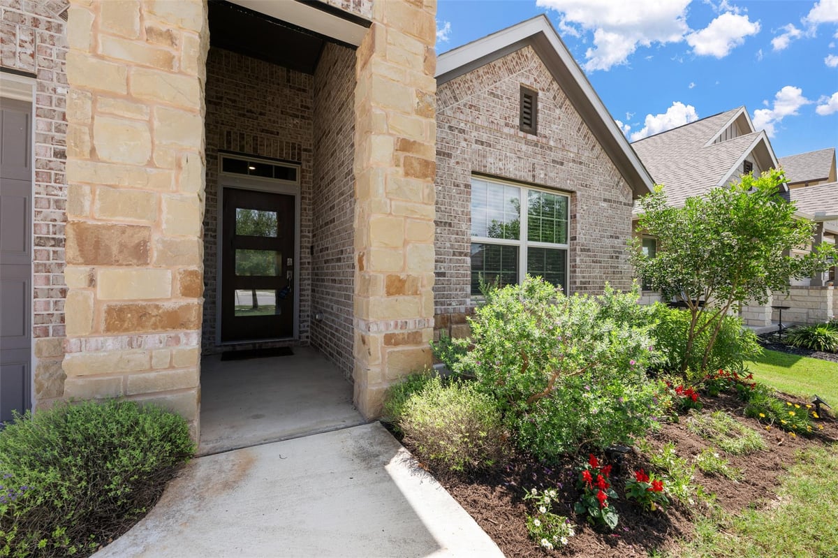 View 303 Cold River RUN in 6 Creeks Ph 1 Sec 2 303 Cold River RUN - front exterior - Luxury home in 6 Creeks Ph 1 Sec 2, Kyle, TX