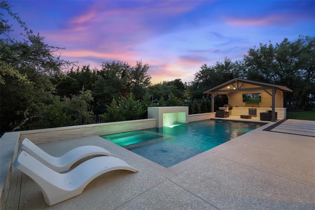 View 303 Dolcetto CT in Rough Hollow Lakeside 303 Dolcetto CT - front exterior - Luxury home in Rough Hollow Lakeside, Austin, TX