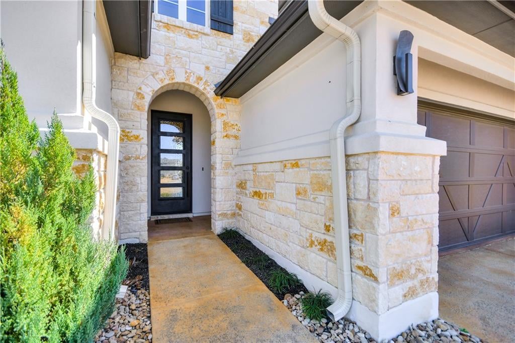 View 303 Sumalt Gap WAY in Lakeway Hlnds Ph 1 Sec 5 303 Sumalt Gap WAY - front exterior - Luxury home in Lakeway Hlnds Ph 1 Sec 5, Austin, TX