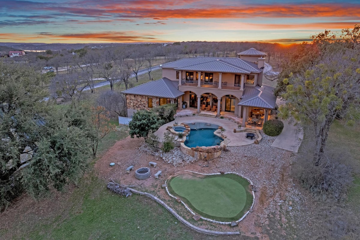 View 303 Yaupon DR in Lake Oaks Ranch 303 Yaupon DR - property photo 1 - Luxury home in Lake Oaks Ranch, Spicewood, TX