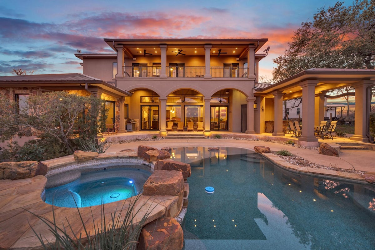 View 303 Yaupon Dr in Lake Oaks Ranch 303 Yaupon Dr - front exterior - Luxury home in Lake Oaks Ranch, Spicewood, TX