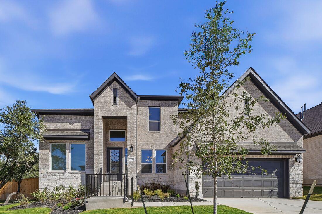 View 304 Kristen Oak Dr in Parkside on the River 304 Kristen Oak Dr - front exterior - Luxury home in Parkside on the River, Georgetown, TX