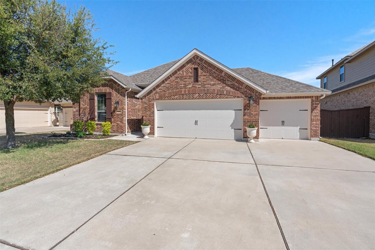View 304 Miracle Rose Way in SANTA RITA RANCH 304 Miracle Rose Way - front exterior - Luxury home in SANTA RITA RANCH, Liberty Hill, TX