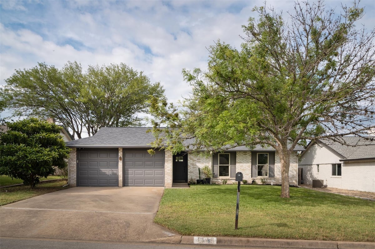 View 304 Skyloop DR in Buckingham Ridge Sec 02 304 Skyloop DR - front exterior - Luxury home in Buckingham Ridge Sec 02, Austin, TX