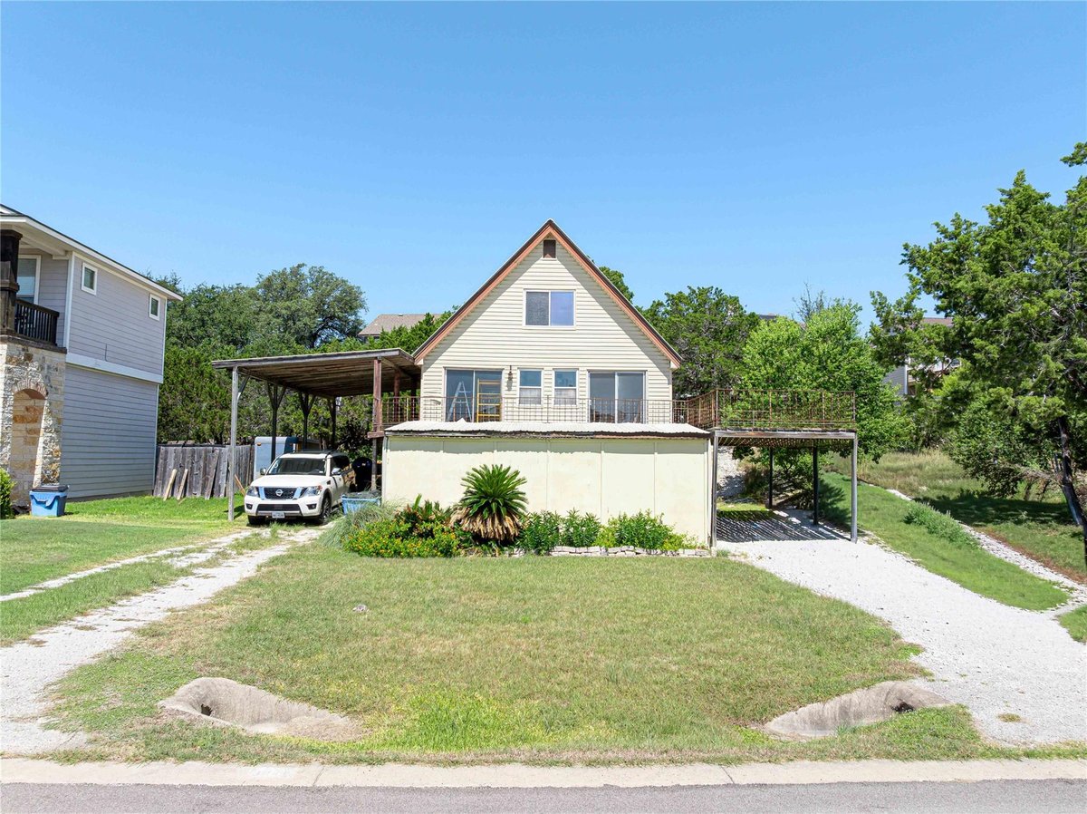 View 304 Southwind RD in Point Venture Sec 03-2 304 Southwind RD - property photo 1 - Luxury home in Point Venture Sec 03-2, Lago Vista, TX