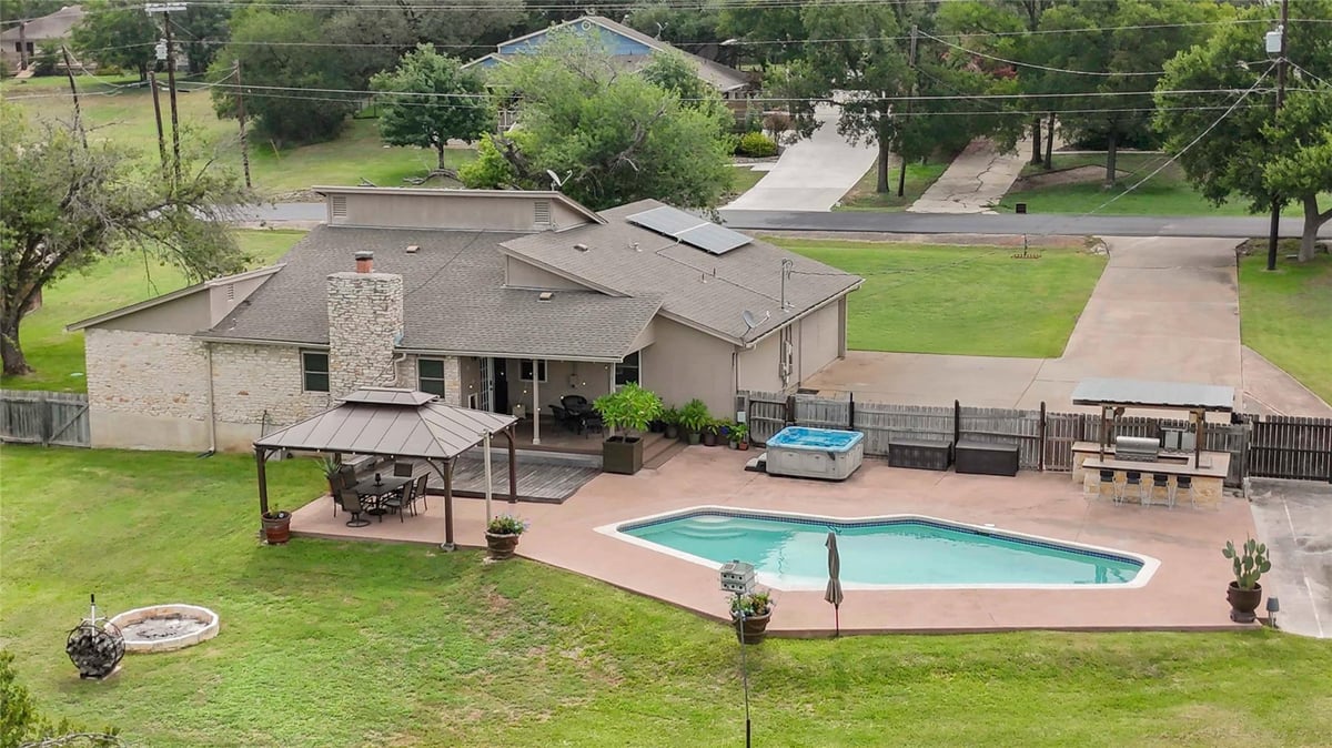 View 305 Canyon Wren Dr in Leisurewoods Sec 2 305 Canyon Wren Dr - property photo 1 - Luxury home in Leisurewoods Sec 2, Buda, TX