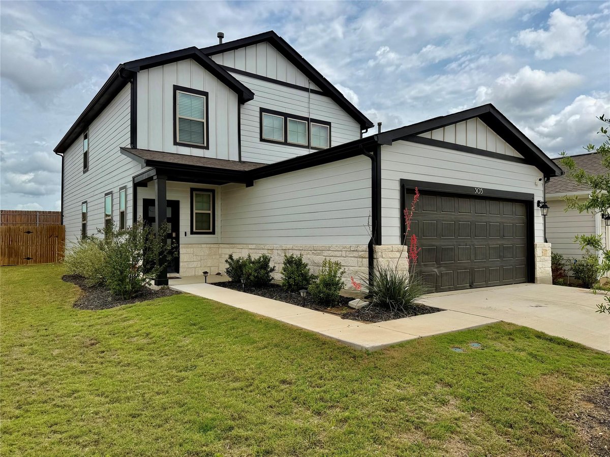 View 305 Tolo Dr in Trinity Ranch 305 Tolo Dr - front exterior - Luxury home in Trinity Ranch, Elgin, TX