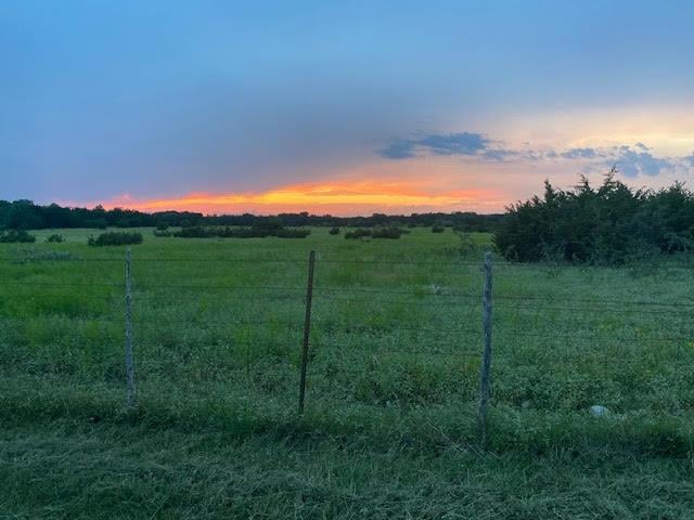 View 3050 County Road 255 in Northcross J Sur Mh Serial Unk 3050 County Road 255 - view with Georgetown-area pasture at sunset - Luxury lot in Northcross J Sur Mh Serial Unk, Georget...