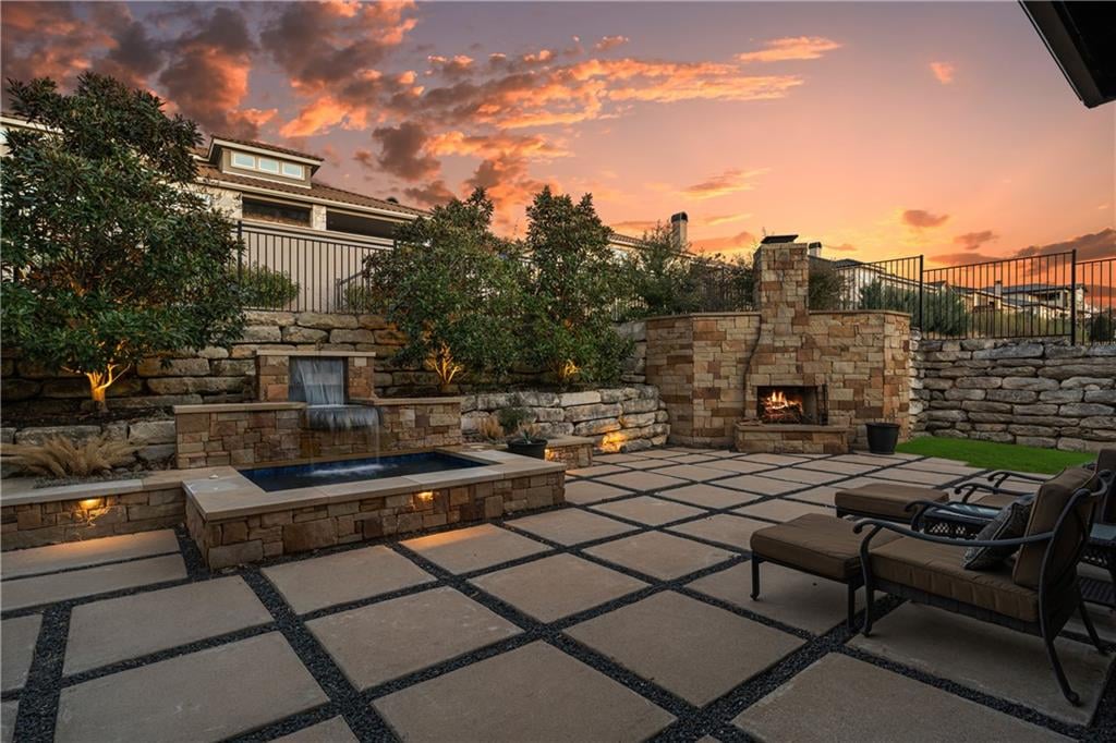 View 306 Bisset CT in Rough Hollow- The Bluffs 306 Bisset CT - front exterior - Luxury home in Rough Hollow- The Bluffs, Austin, TX