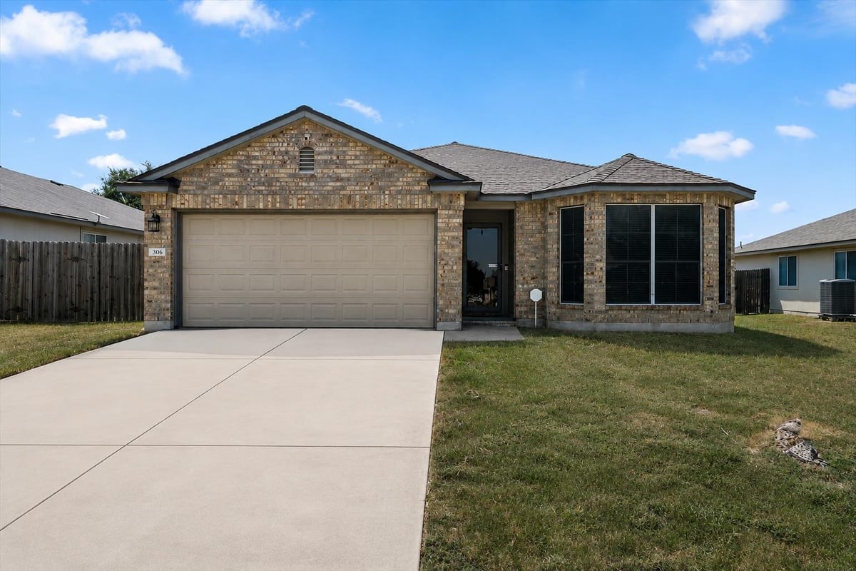 View 306 Creston ST in Riverwalk Ph 01 Sec 02 306 Creston ST - front exterior - Luxury home in Riverwalk Ph 01 Sec 02, Hutto, TX