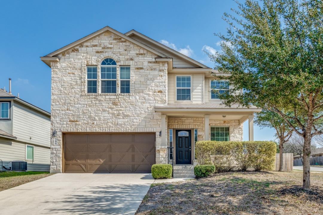 View 306 Oak Creek Way in Oak Creek Estates Ph 1B 306 Oak Creek Way - front exterior - Luxury home in Oak Creek Estates Ph 1B, New Braunfels, TX
