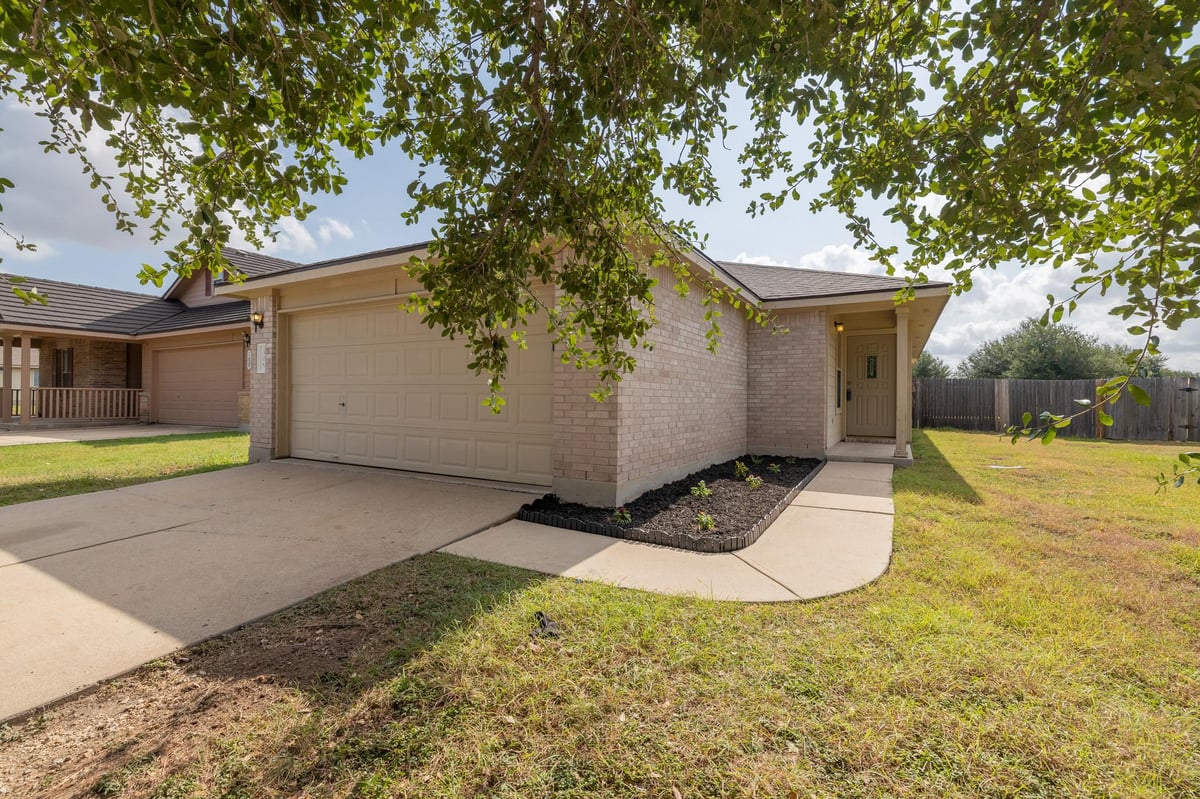 View 306 Quail Hollow DR in Brushy Creek Meadows Sec 02 306 Quail Hollow DR - property photo 1 - Luxury home in Brushy Creek Meadows Sec 02, Hutto, TX