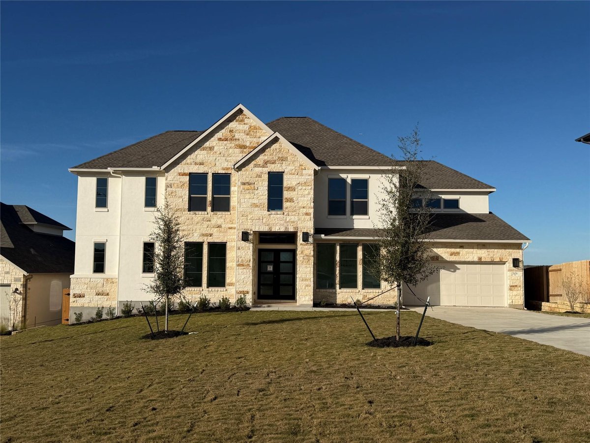 View 306 Yaklin Dr in Lariat 306 Yaklin Dr - front exterior - Luxury home in Lariat, Liberty Hill, TX
