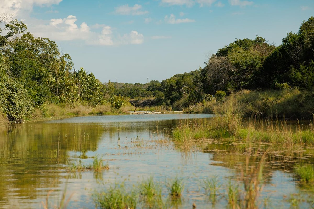 View with waterfront views at 3067 Ranch Road 1888 - Blanco, TX