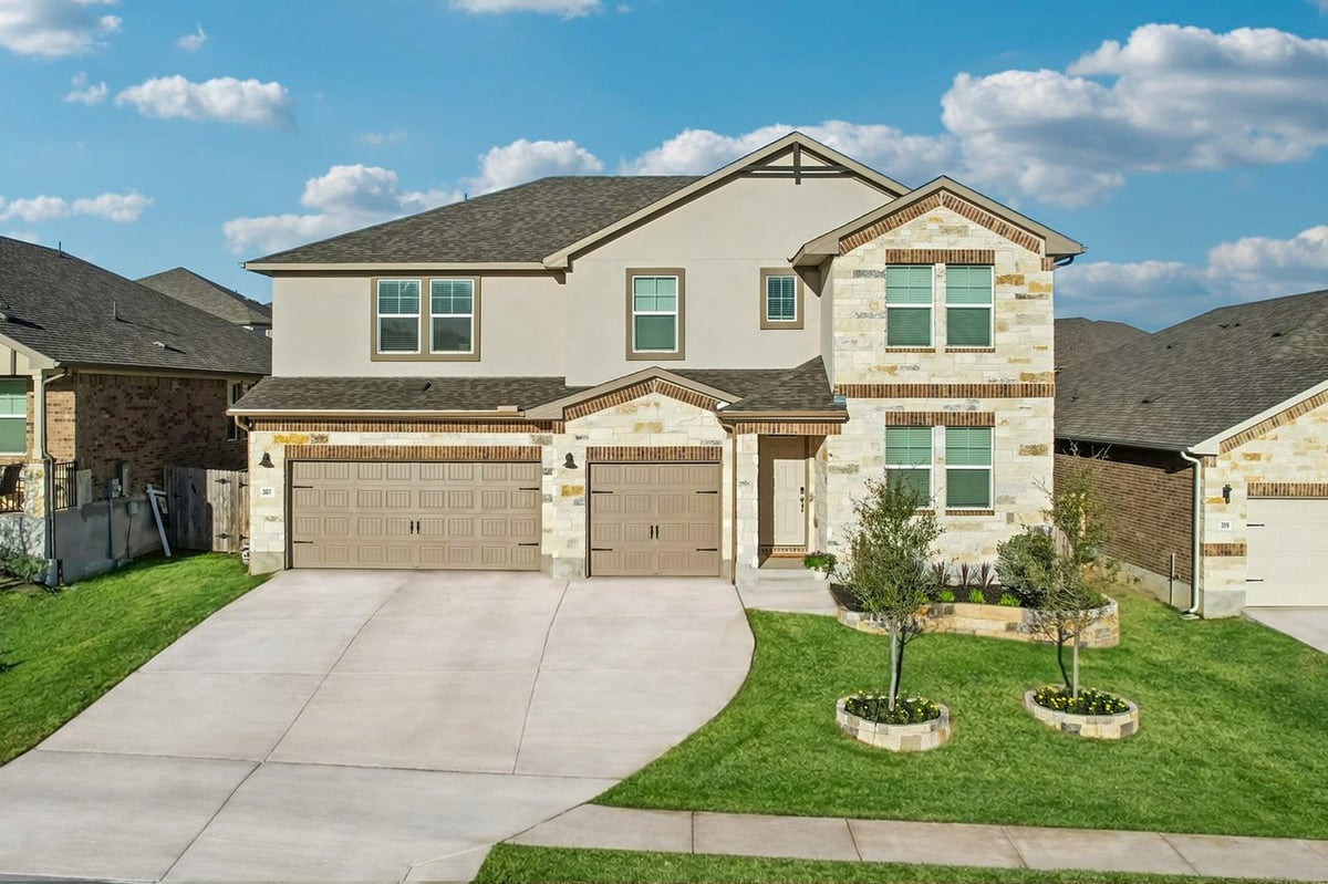 View 307 Cathedral Mountain Dr in Big Sky Ranch 307 Cathedral Mountain Dr - front exterior - Luxury home in Big Sky Ranch, Dripping Springs, TX