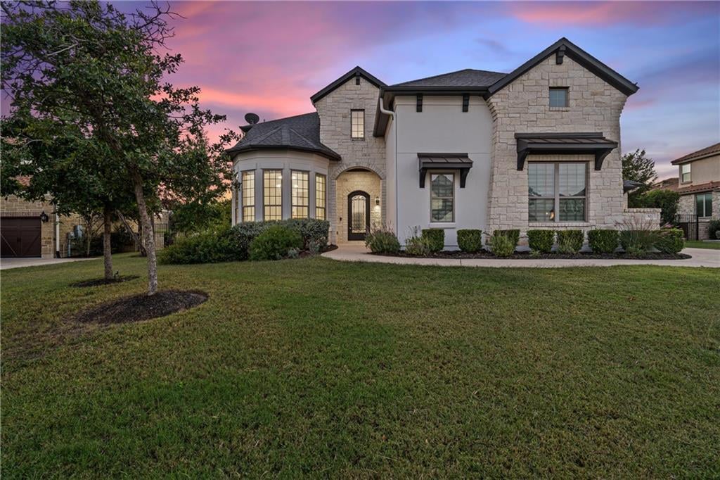 View 307 Dolcetto CT in Rough Hollow Lakeside 307 Dolcetto CT - front exterior - Luxury home in Rough Hollow Lakeside, Lakeway, TX