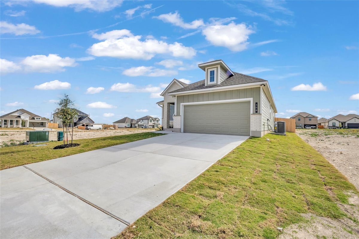 View 308 Boatright Blvd in Eastern Wells 308 Boatright Blvd - front exterior - Luxury home in Eastern Wells, Jarrell, TX
