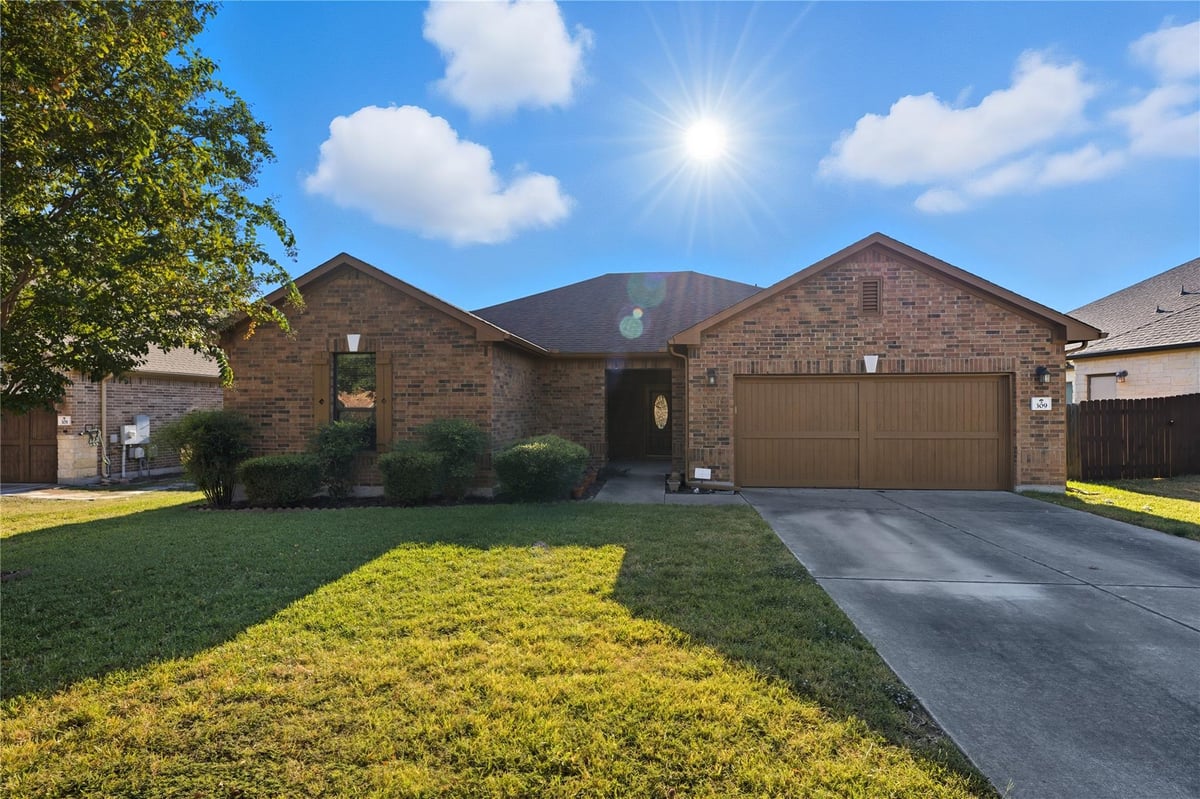 View 309 Hogg Pecan Pass in Oak At Twin Creeks Sec 04 The 309 Hogg Pecan Pass - front exterior - Luxury home in Oak At Twin Creeks Sec 04 The, Austin, TX