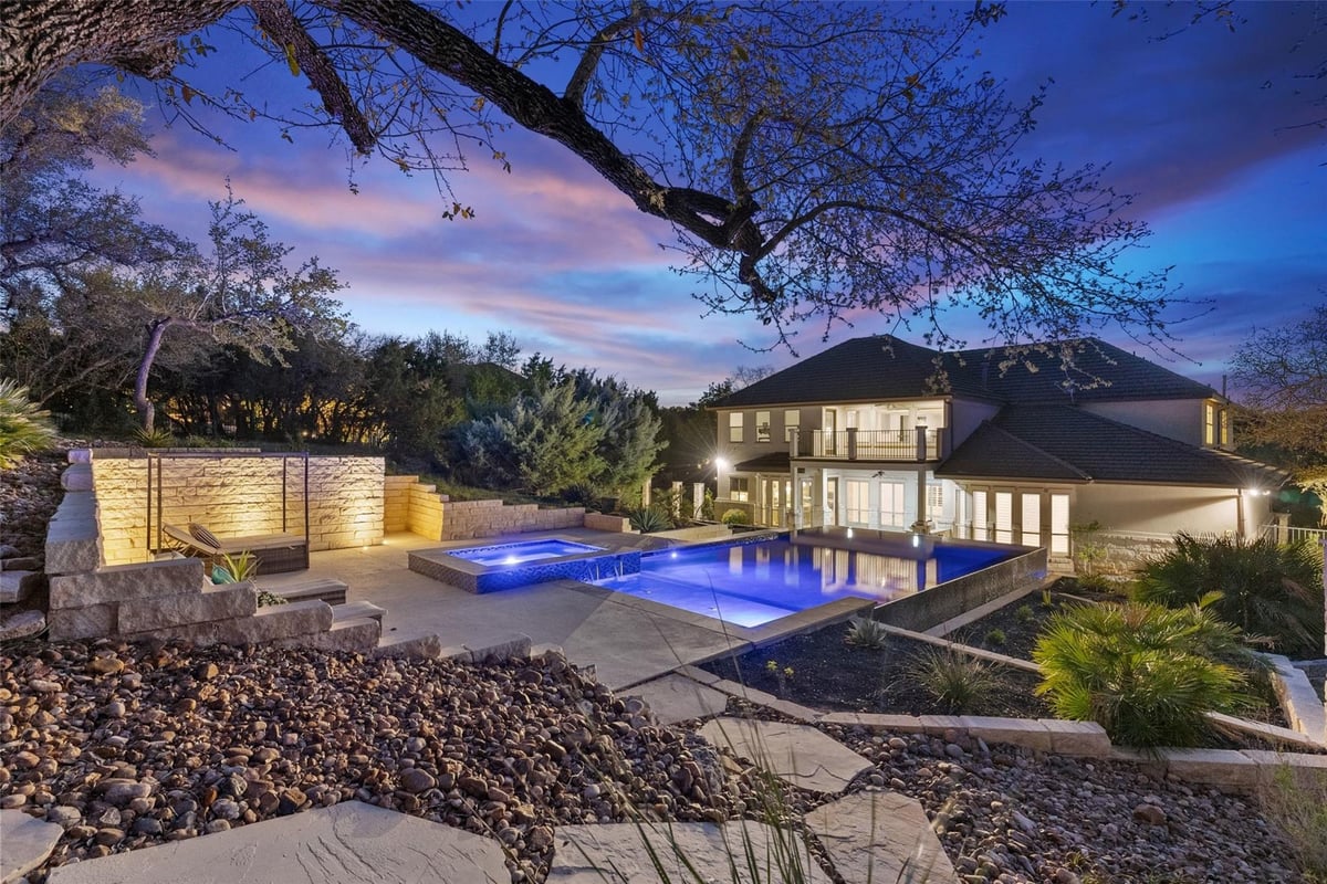 View 310 Bella Montagna Cir in Bella Montagna 310 Bella Montagna Cir - pool area with twilight pool and spa - Luxury home in Bella Montagna, Austin, TX