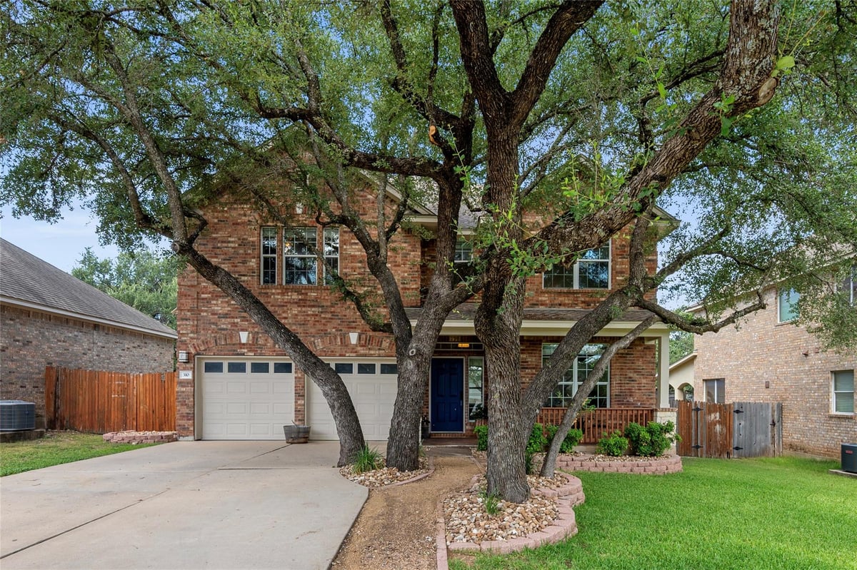 View 310 S Lynnwood TRL in Forest Oaks 310 S Lynnwood TRL - front exterior - Luxury home in Forest Oaks, Cedar Park, TX