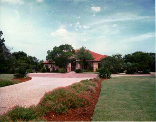 View 3103 Point O' Woods in FOOTHILLS OF BARTON CREEK TH 3103 Point O' Woods - front exterior - Luxury home in FOOTHILLS OF BARTON CREEK TH, Austin, TX