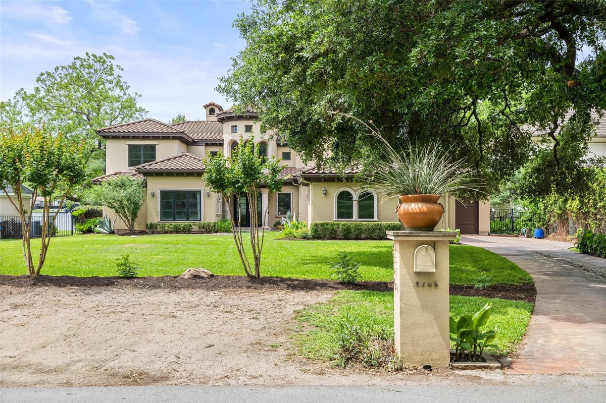 Aerial view with Lake Austin waterfront estate at 3104 Rivercrest Dr - 4 bed 5 bath home