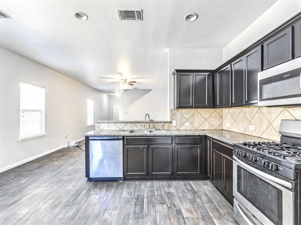 Kitchen at 3108 Tilmon Ln - 4 bed 2 bath home