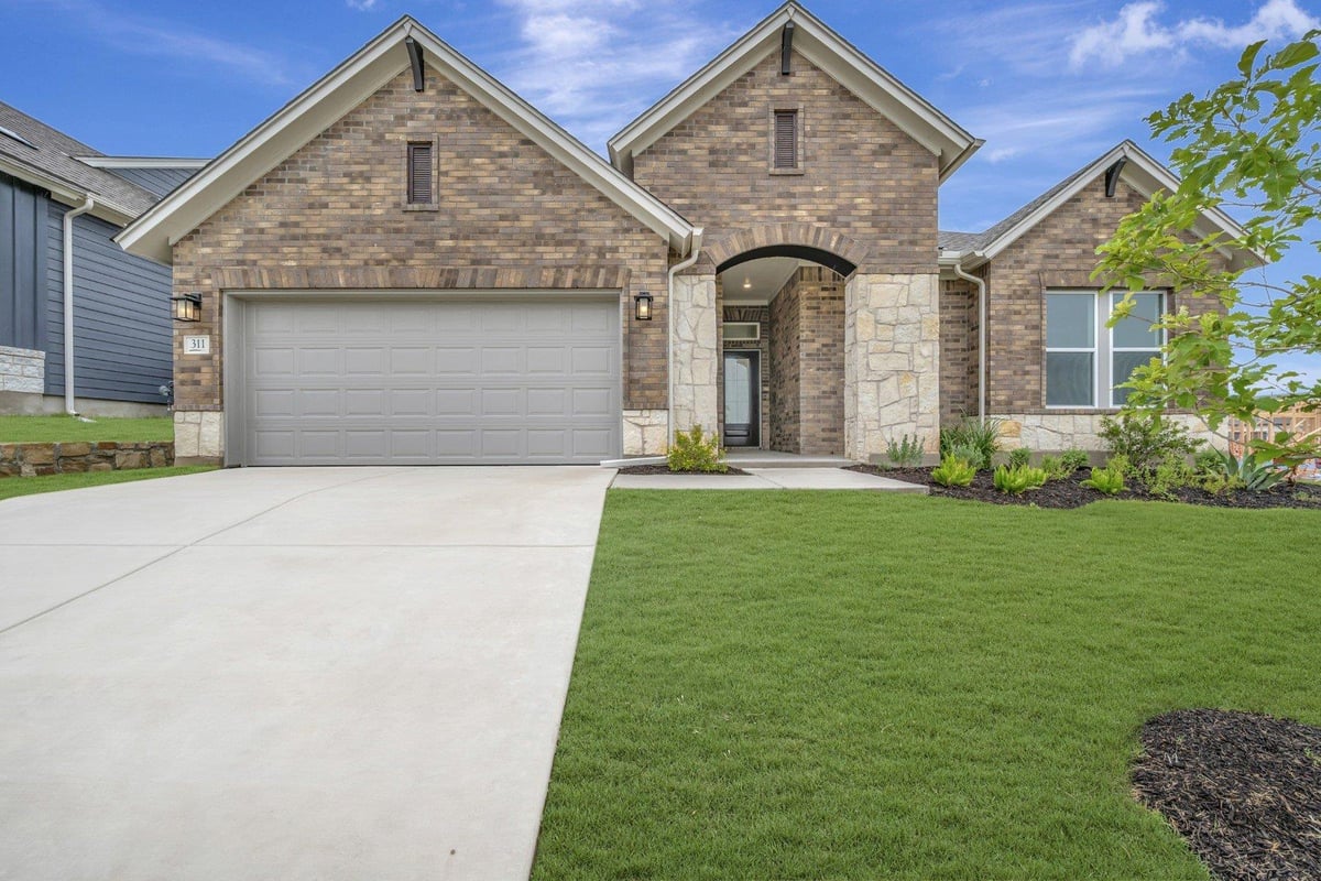 View 311 Flowering Senna DR in Sunfield 311 Flowering Senna DR - property photo 1 - Luxury home in Sunfield, Buda, TX