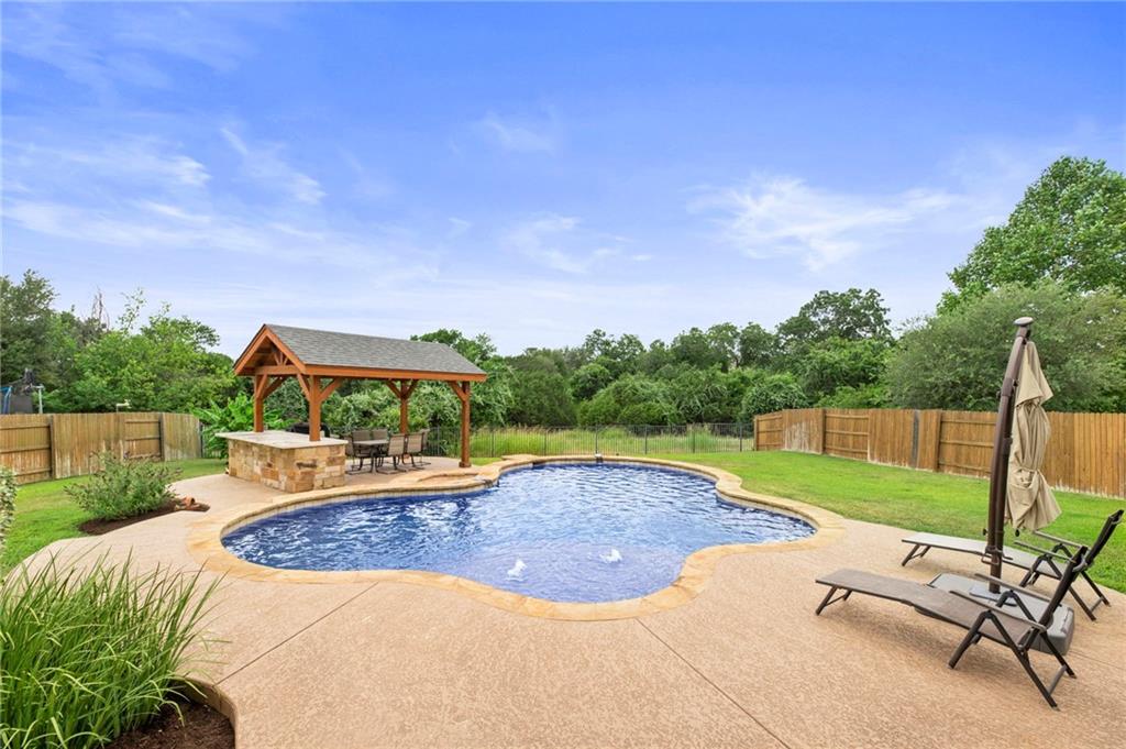 View 311 Littleton Dr in Belterra Ph 2 Sec 5B 311 Littleton Dr - front exterior - Luxury home in Belterra Ph 2 Sec 5B, Austin, TX