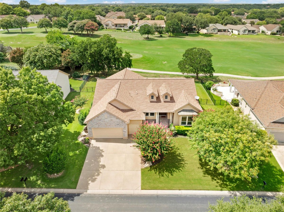 View 311 Trail Of The Flowers in Sun City Georgetown Ph 02 Nbrh 311 Trail Of The Flowers - front exterior - Luxury home in Sun City Georgetown Ph 02 Nbrh, Georgetown, TX