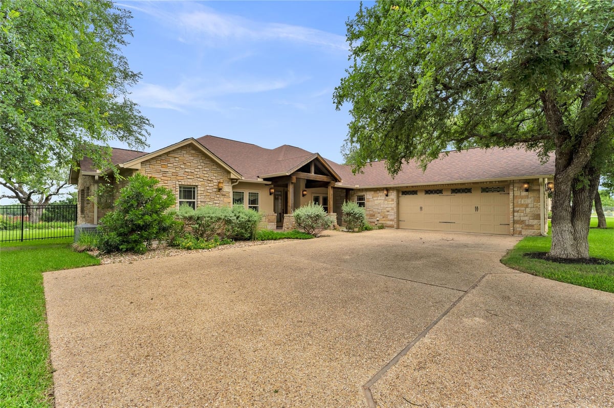 View 311 Yellow Ribbon TRL in Ranch At Delaware Creek 311 Yellow Ribbon TRL - front exterior - Luxury home in Ranch At Delaware Creek, Burnet, TX