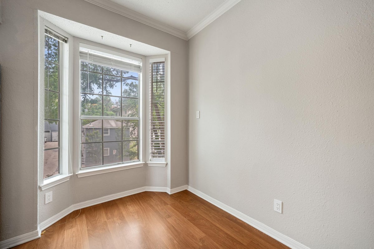 Primary bedroom at 3111 Tom Green St Unit #208 - 2 bed 2 bath home