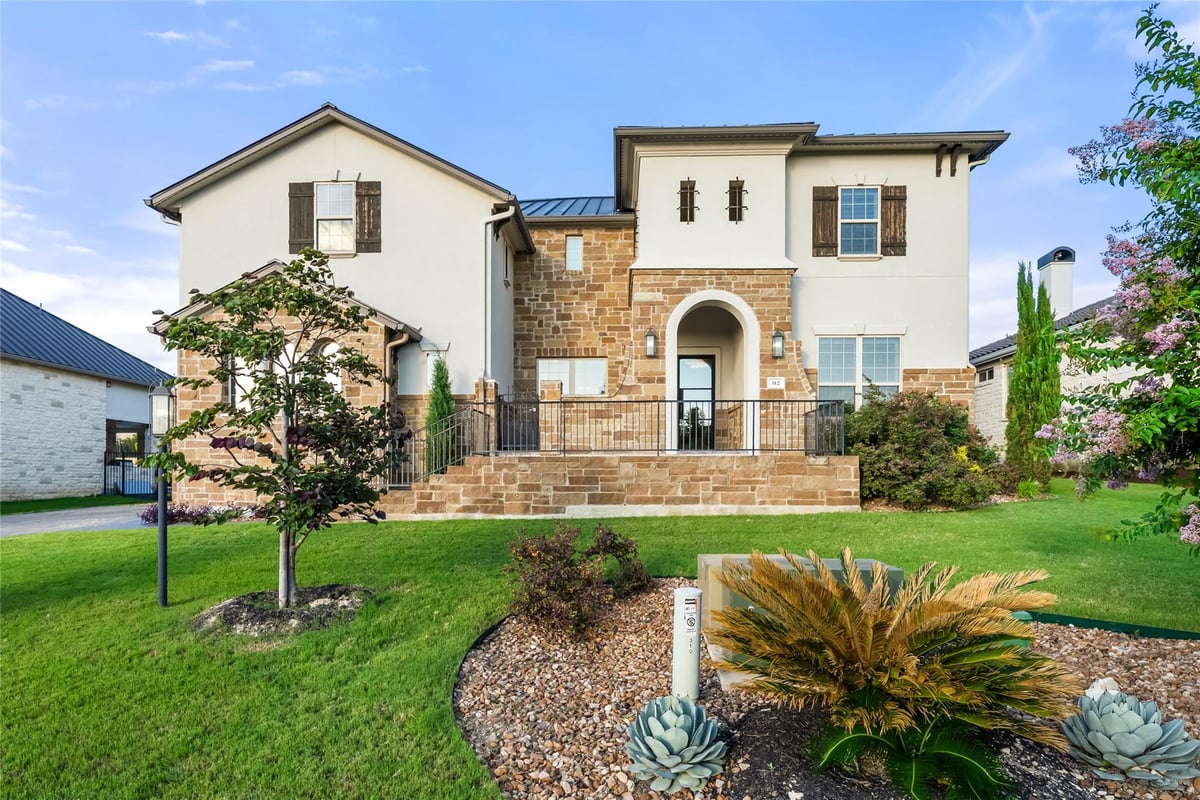 View 312 Bisset CT in Rough Hollow Sec 1 Amdlt1-6,11 312 Bisset CT - front exterior - Luxury home in Rough Hollow Sec 1 Amdlt1-6,11, Austin, TX