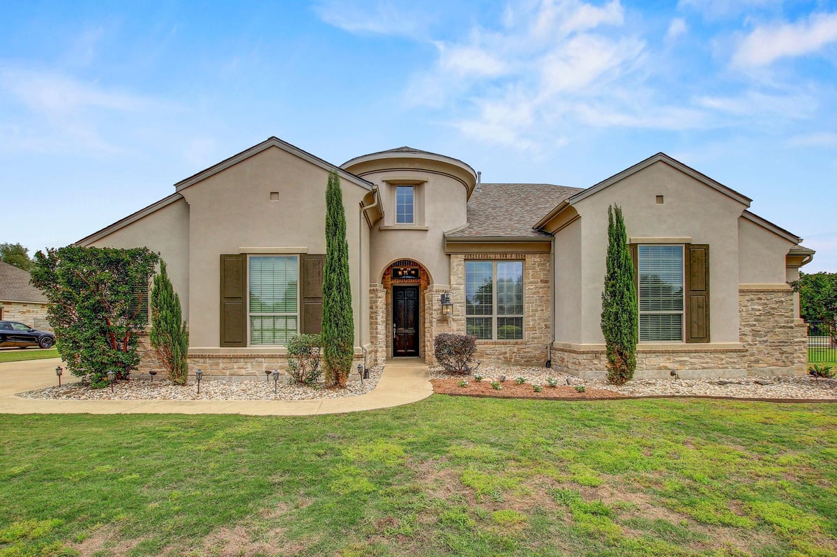 View 312 Flintlock Dr in Reagans Overlook 312 Flintlock Dr - front exterior - Luxury home in Reagans Overlook, Leander, TX
