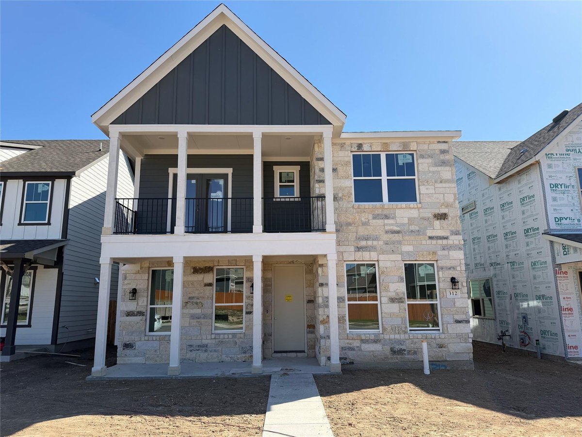 View 312 Leeland Dr in Lariat 312 Leeland Dr - front exterior - Luxury home in Lariat, Liberty Hill, TX