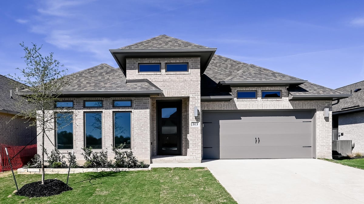 View 313 Foxfire CV in Juniper Springs 313 Foxfire CV - front exterior - Luxury home in Juniper Springs, Lockhart, TX