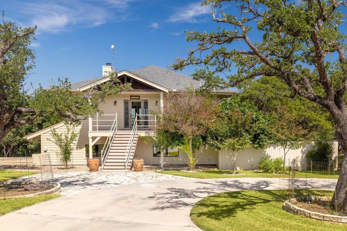 View 313 Kendall DR in Windermere Oaks 313 Kendall DR - property photo 1 - Luxury home in Windermere Oaks, Spicewood, TX