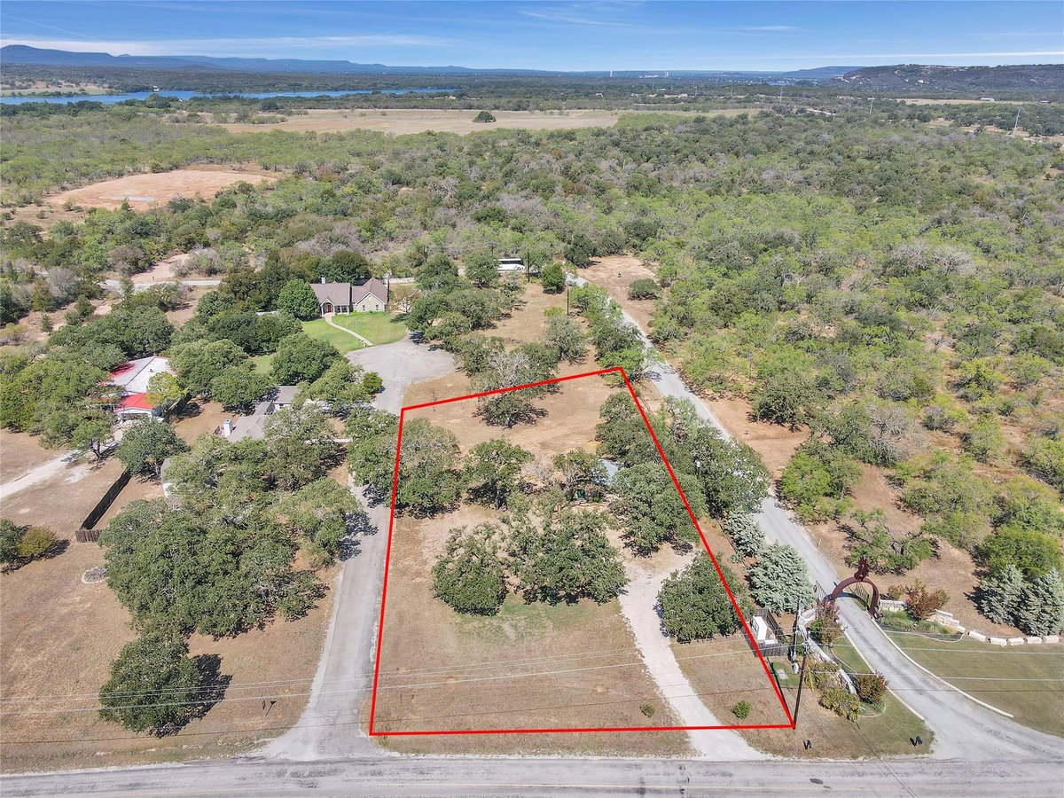 View 314 Camp Rd in Highland Haven 314 Camp Rd - front exterior - Luxury lot in Highland Haven, Marble Falls, TX