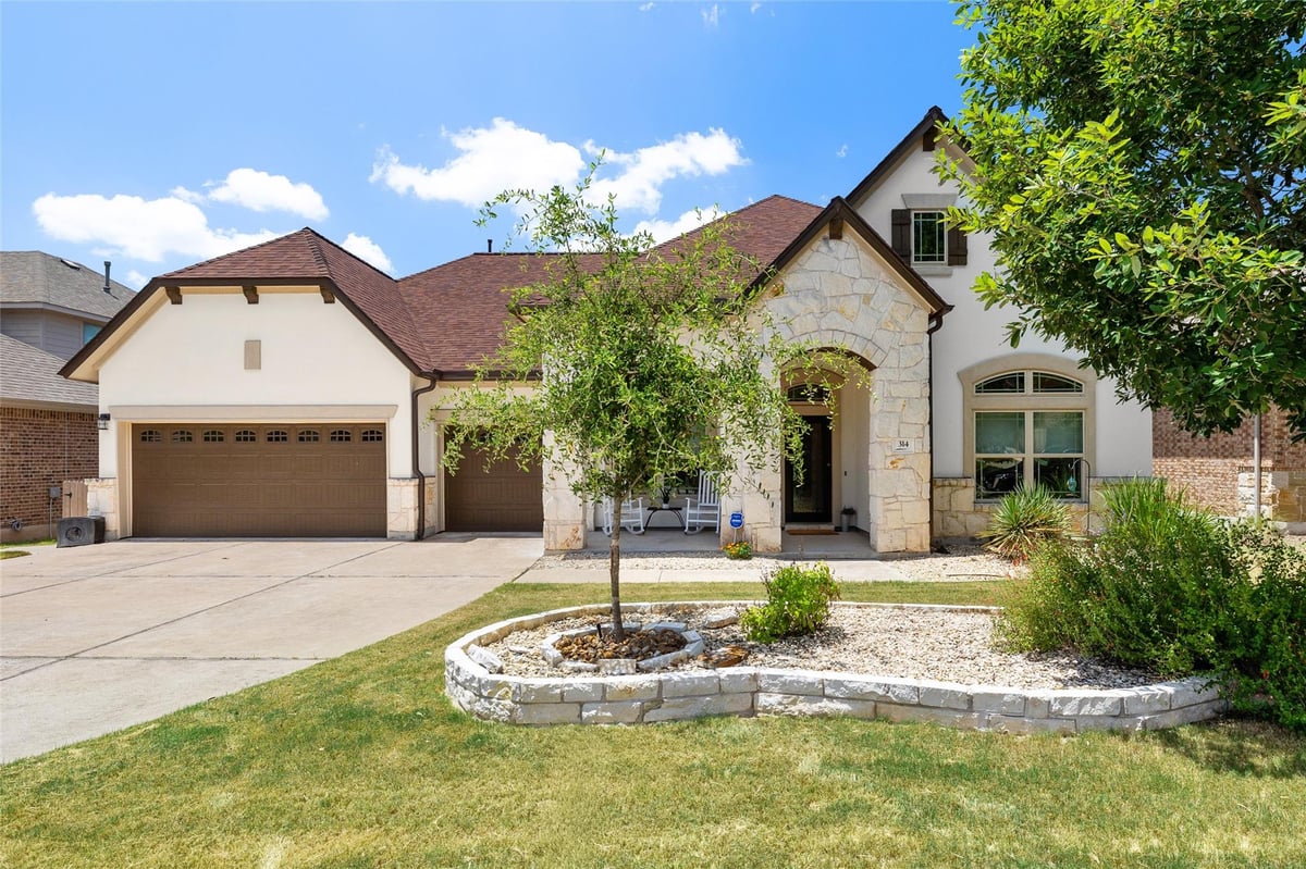 View 314 Merion DR in Belterra Ph 4 Sec 13 314 Merion DR - front exterior - Luxury home in Belterra Ph 4 Sec 13, Austin, TX