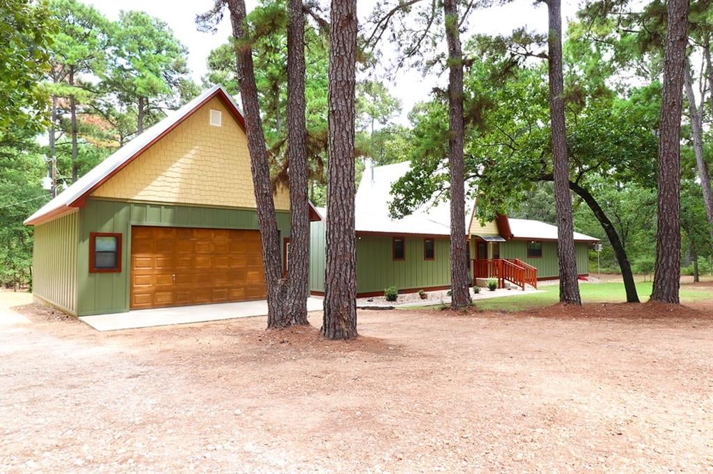 View 314 Pine Tree LOOP 314 Pine Tree LOOP - front exterior - Luxury home in Bastrop, TX