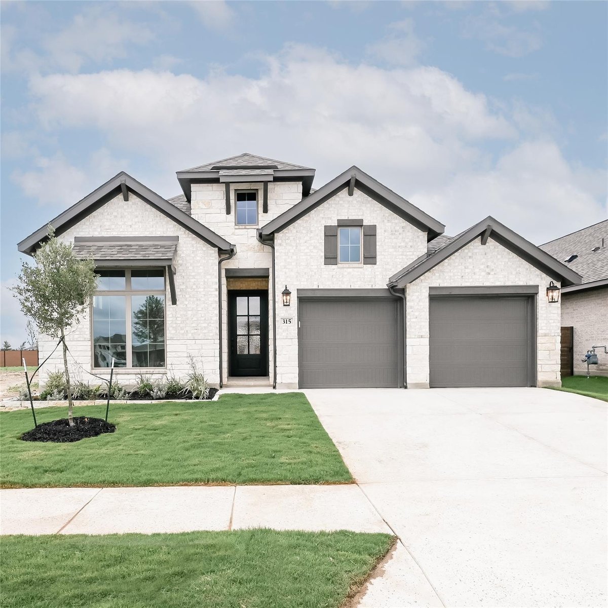 View 315 Foxfire CV in Juniper Springs 315 Foxfire CV - front exterior - Luxury home in Juniper Springs, Lockhart, TX