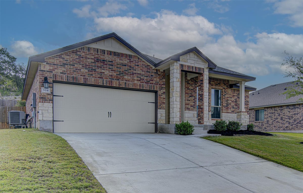 View 316 Pepper Mill LOOP in Pepper Mill Sub Ph 1 316 Pepper Mill LOOP - front exterior - Luxury home in Pepper Mill Sub Ph 1, Burnet, TX