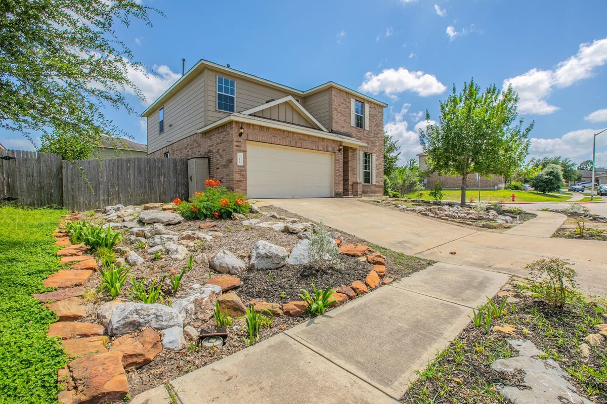 View 316 Pine Arbol in Sunfield Ph One Sec Six 316 Pine Arbol - front exterior - Luxury home in Sunfield Ph One Sec Six, Buda, TX