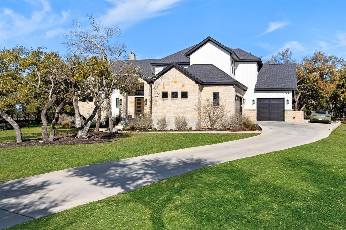 View 316 Stockman Dr in Bunker Ranch 316 Stockman Dr - front exterior - Luxury home in Bunker Ranch, Dripping Springs, TX