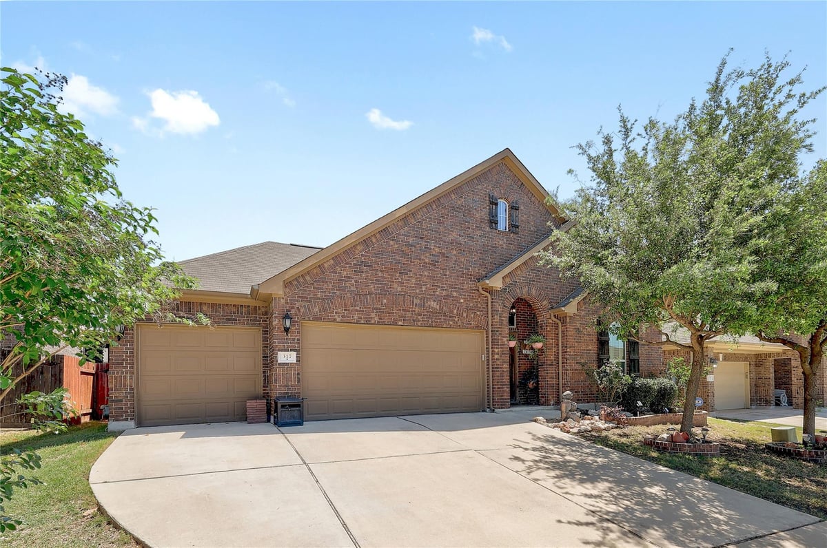 View 317 Orchard Hill Trl in Sunfield Ph Two Sec Two 317 Orchard Hill Trl - front exterior - Luxury home in Sunfield Ph Two Sec Two, Buda, TX