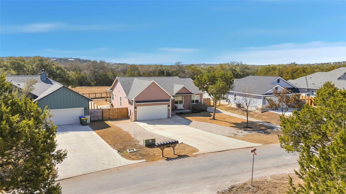 View 32 Acacia Dr in Woodcreek Sec 8 32 Acacia Dr - front exterior - Luxury home in Woodcreek Sec 8, Wimberley, TX