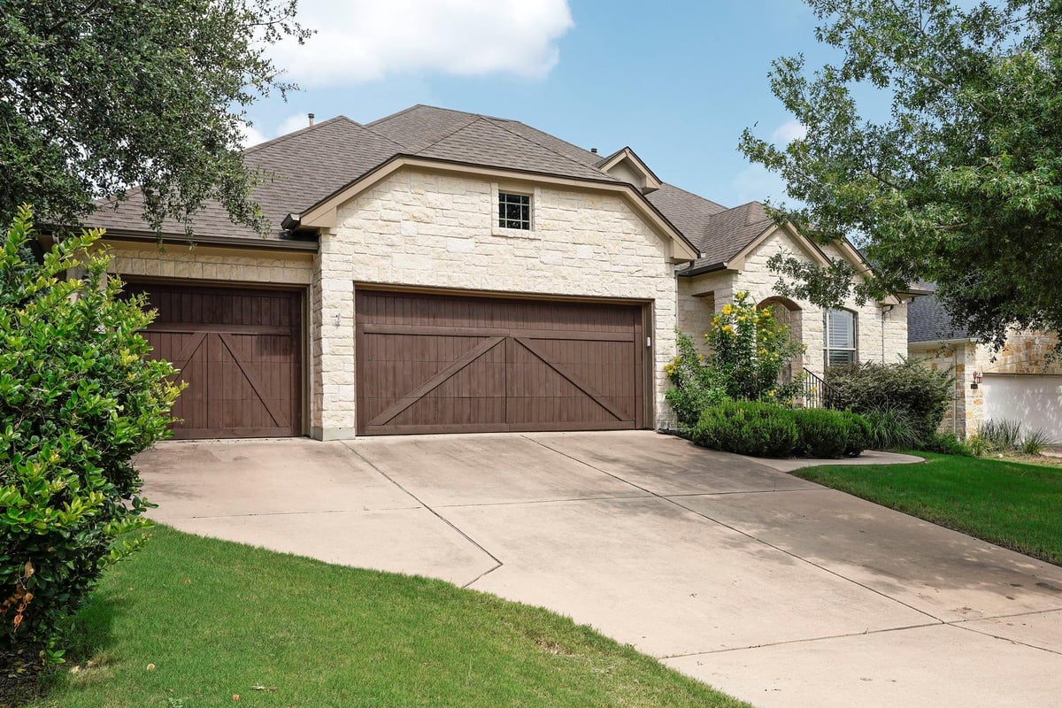 View 320 Torrington Dr in Belterra Ph Ii Sec 9B 320 Torrington Dr - front exterior - Luxury home in Belterra Ph Ii Sec 9B, Austin, TX