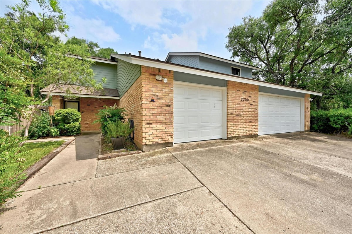View 3200 Twinberry CV Unit #A in Beecave Woods Sec 03 A 3200 Twinberry CV Unit #A - property photo 1 - Luxury home in Beecave Woods Sec 03 A, Austin, TX