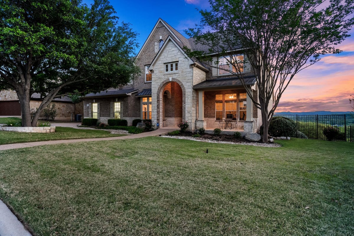 View 3205 Wild Canyon LOOP in Steiner Ranch Ph 02 Sec 05 3205 Wild Canyon LOOP - front exterior with twilight luxury facade - Luxury home in Steiner Ranch Ph 02 Sec 05, Austin, TX