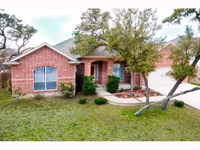 View 321 Abbey Dr in Belterra Ph 01 Sec 08 321 Abbey Dr - front exterior - Luxury home in Belterra Ph 01 Sec 08, Austin, TX